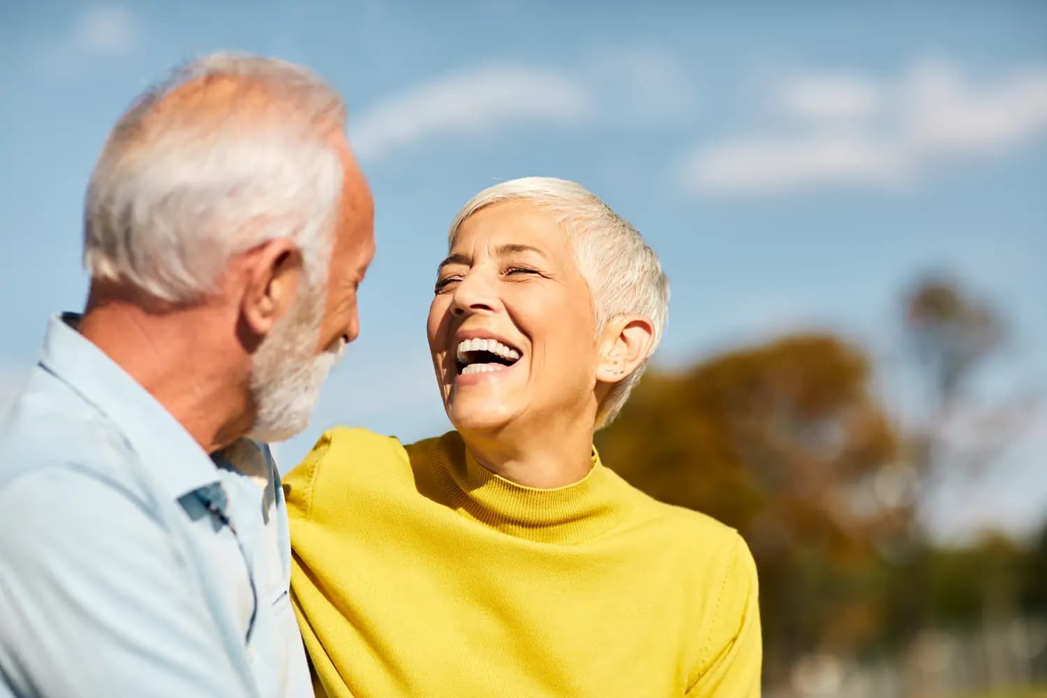 An older couple smiling together